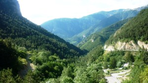 View south over the lush Roya valley and towards the coastline from the Col de Tende at the French-Italian border