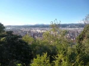The beautiful view from the waterfall over the city of Nice and the moutains to the west