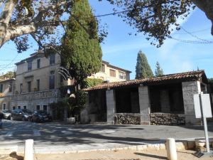 Typical Provence: the legendary Colombe d'Or Hotel next to a traditional laundry trough