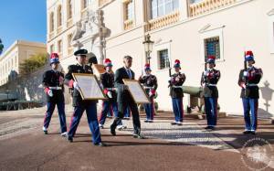 The head of the Public Forces, Colonel Fringant and the Prince's Chamberlain, Lt-Colonel Soler, nailing the proclamation to the Palace doors (C) Palais Princier de Monaco